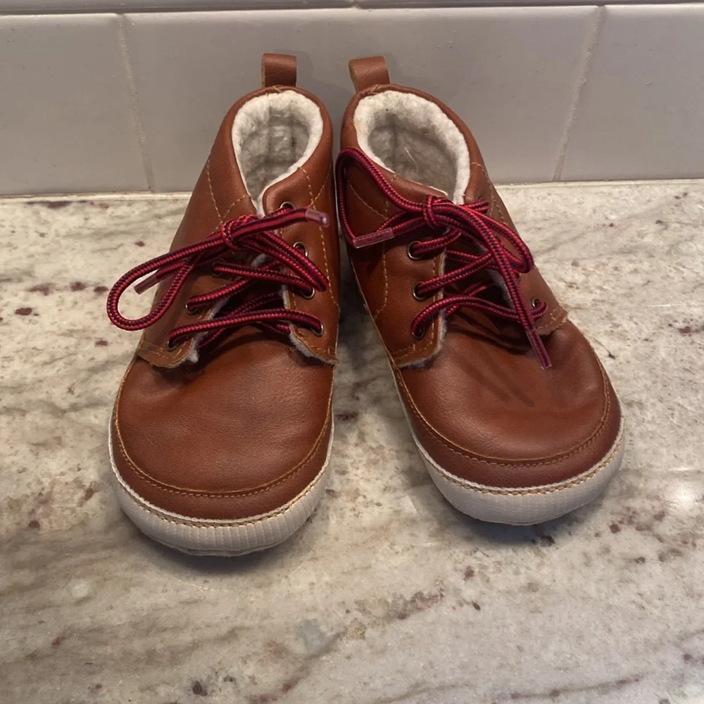 Baby Gap size 18-24 months brown bootie with Sherpa lining. Red laces.  Like new